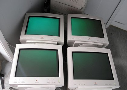 old blocky computers, flat and green on screen