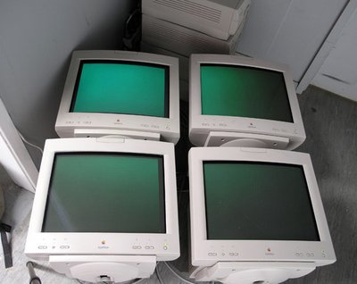 old blocky computers, flat and green on screen