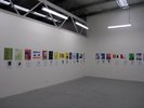 colourful posters across middle of walls