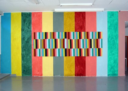 colourful shapes concetrated in middle and stripes on outside