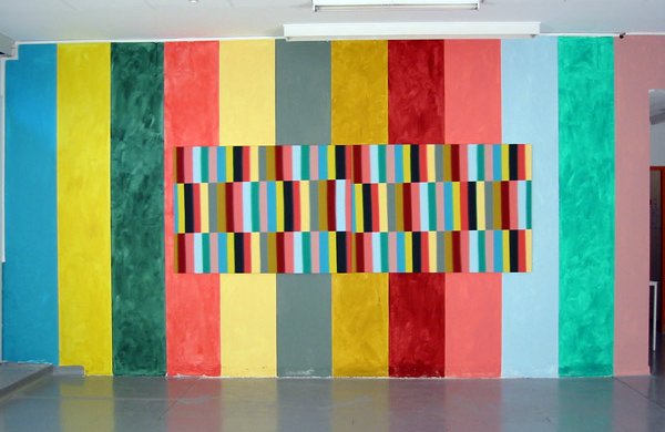 colourful shapes concetrated in middle and stripes on outside