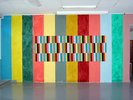 colourful shapes concetrated in middle and stripes on outside