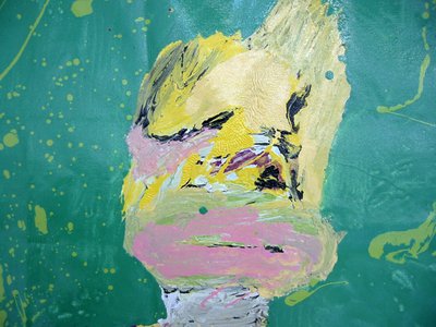 green yellow squished paint, almost like a face
