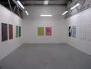 patterns on wall, colours on two sides of the room. Neatly hung