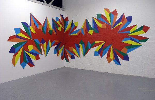 geometric shapes, rainbow. Plenty of red and other primary colours