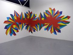 geometric shapes, rainbow. Plenty of red and other primary colours