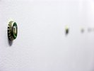close up bottle cap on wall