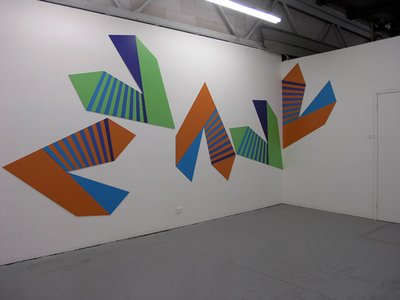 geometric shapes, patterned. Orange and blue, and green and purple with blue