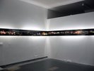 cityscape through middle of wall