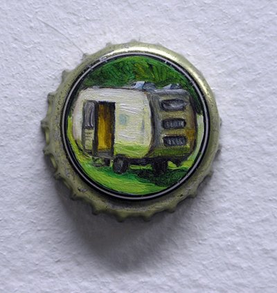 bottlecap with painting of caravan