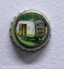 bottlecap with painting of caravan