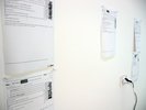 white papers on wall staggered
