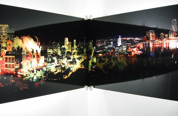 cityscape fracturing and meeting on a wall