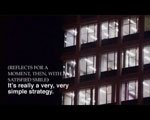text against grid of buildings. Monochromatic