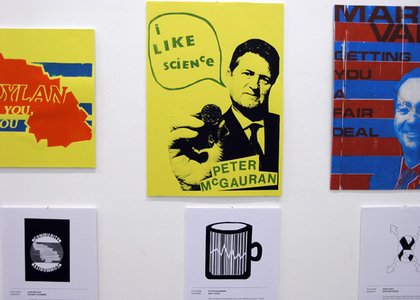 yellow and blue and red posters with faces