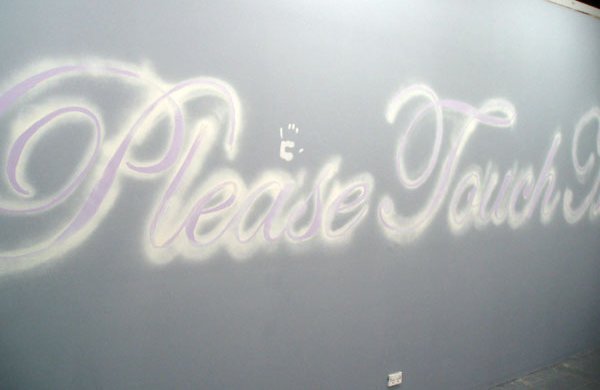 please touch cursive in grey and beige