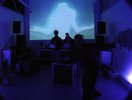 dimly lit purple/blue room